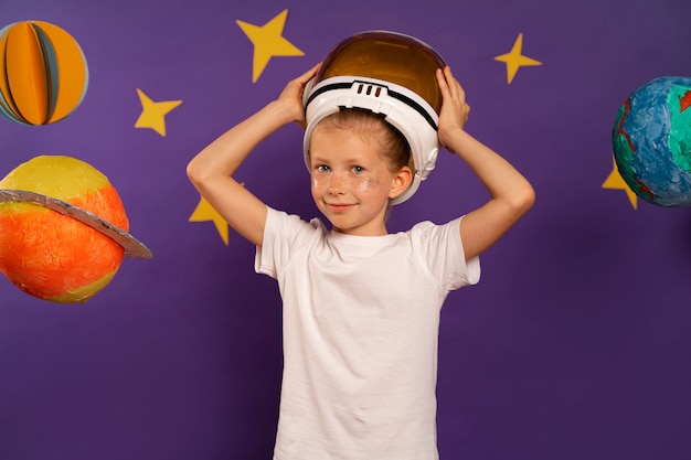 Front view smiley kid with helmet