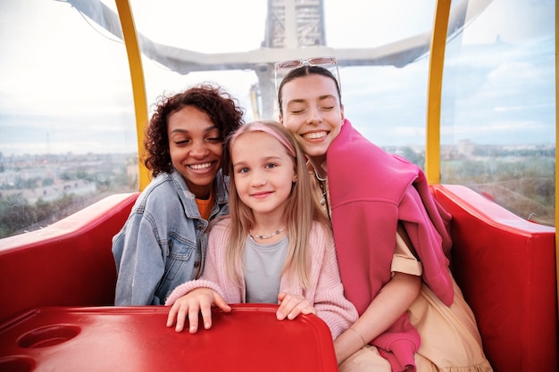 Front view smiley people on the ferris wheel