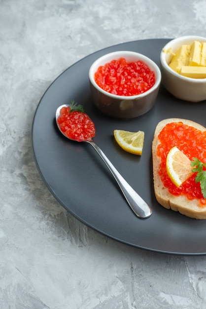 front view tasty caviar sandwiches inside plate with cheese on white surface snack dinner fish food meal dish bread breakfast toasts