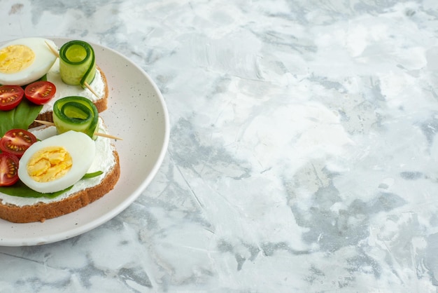 front view tasty egg sandwiches with tomatoes inside plate white surface background lunch sandwich food bread burger health diet meal free space