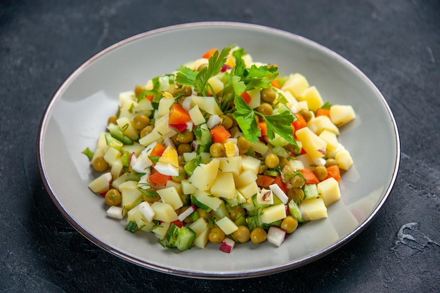 front view tasty salad consists of eggs beans potatoes and carrot on dark surface cuisine health lunch bread meal horizontal colour diet food