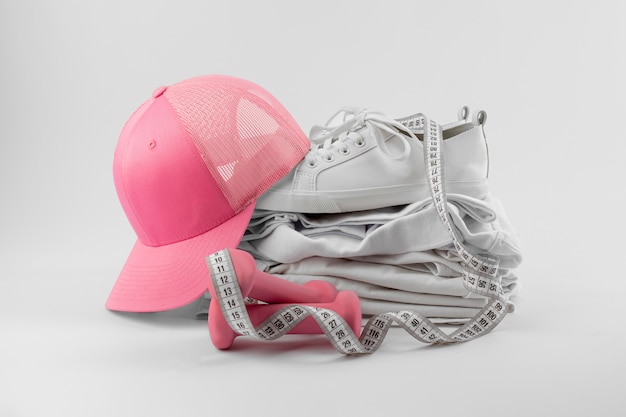 Front view of trucker hat with exercise equipment