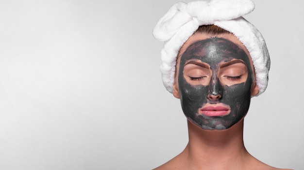 Front view woman with face mask on