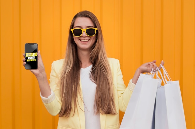 Front view woman with shopping bags