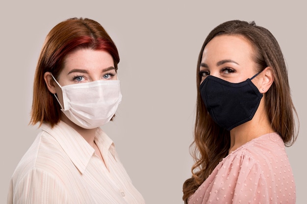 Front view of women with face mask concept