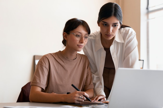 Front view women working together