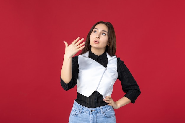 front view young waitress in uniform suffering from heat on red background color job work restaurant dinner dish cafe evening worker