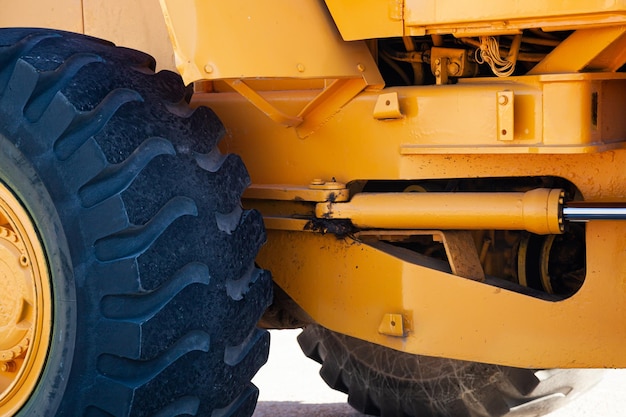 Frontal bulldozer loader Yellow excavator close up