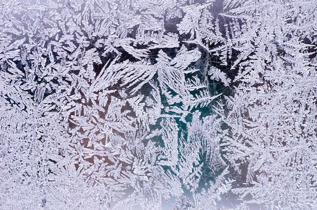 Photo frosty natural pattern on winter window