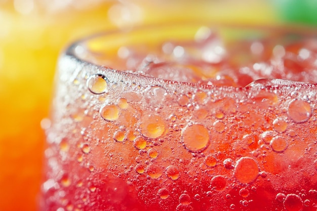 Photo frosty orange soda with bubbles photo