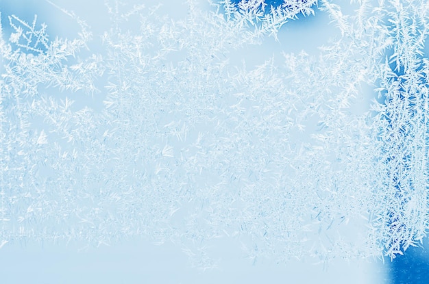 Frosty patterns on a blue background for a Christmas scene