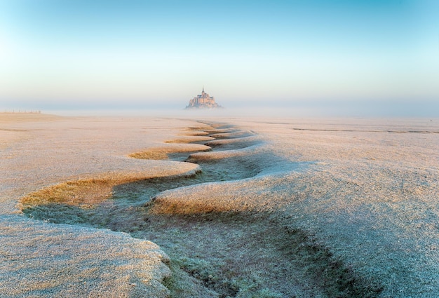 A frosty winters day on the salt marshes overlooking Mont St Michel