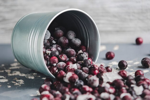 Frozen cherries on light grey background