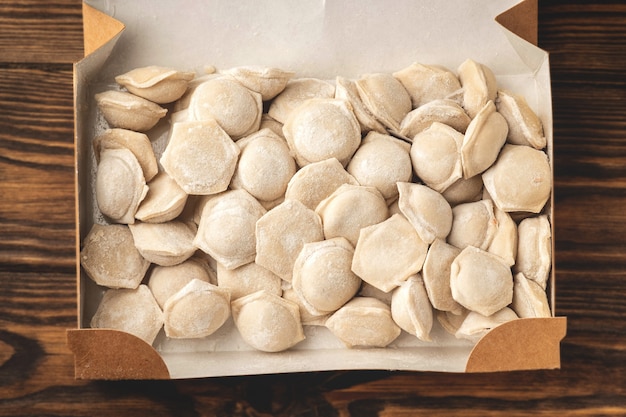 Frozen dumplings in kraft packaging, close-up