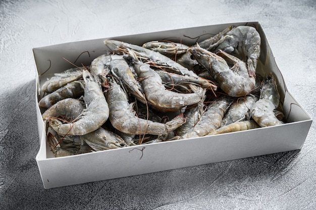 Frozen fresh big shrimps, prawns prepared for seafood cooking.