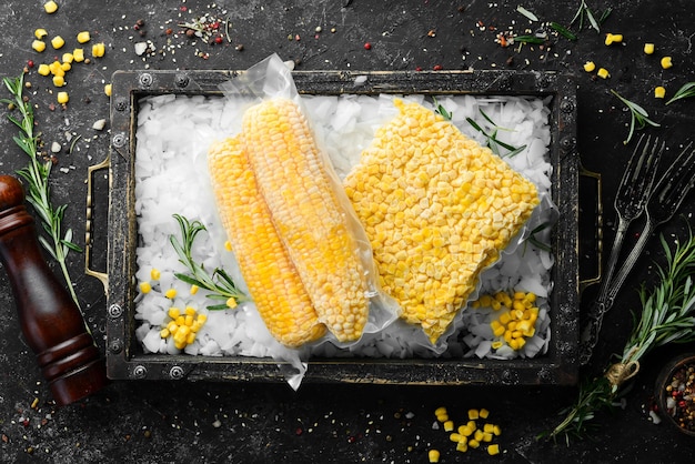 Frozen fresh corn Food supplies Top view Free space for your text