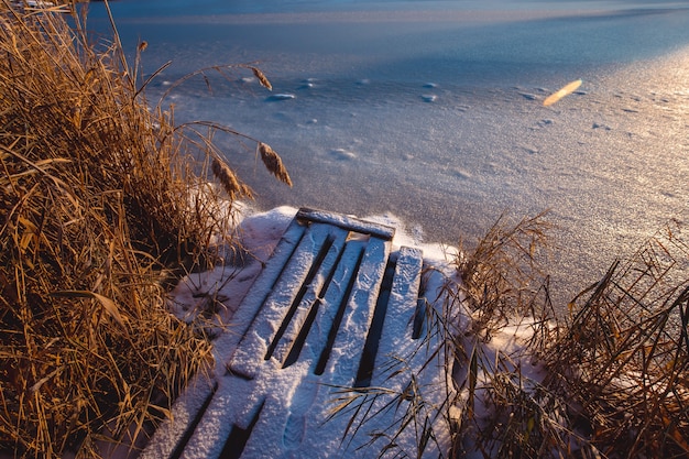 Frozen lake at winter. Early morning light.