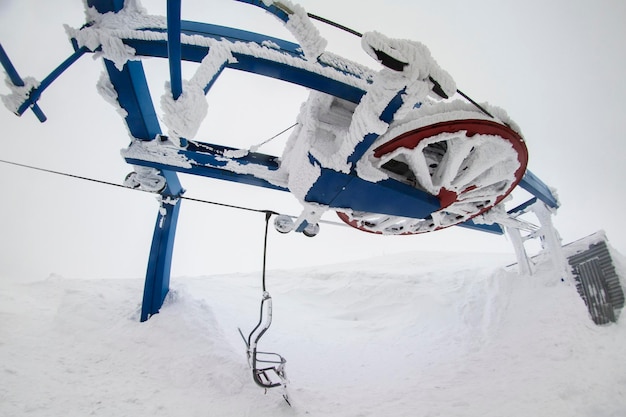 Frozen snow in the mountains on an old lift