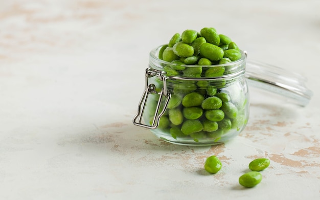 Frozen soy beans in a glass jar freezing is a safe method of increasing the shelf life of nutritious...