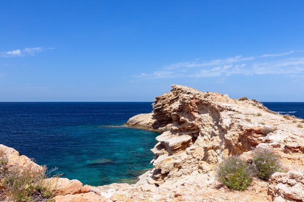 Frozen wave in stone at the cape of Punta Galera in Ibiza, Spain