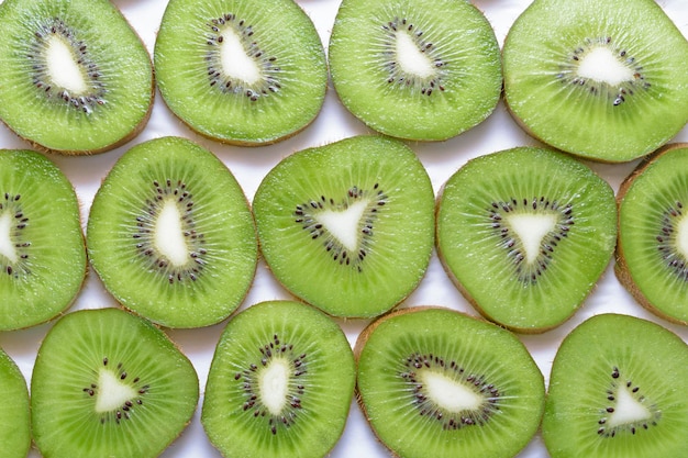 Fruit background consisting of kiwi slices