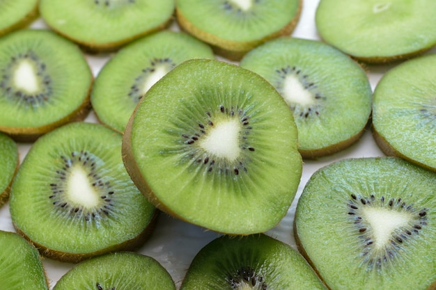 Fruit background consisting of kiwi slices