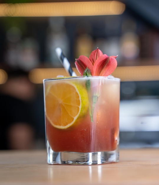 Fruit cocktail on a bar counter by Yuri Ugarte Cespedes