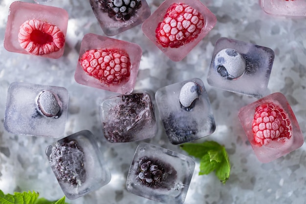 Fruit ice cubes with organic berries.