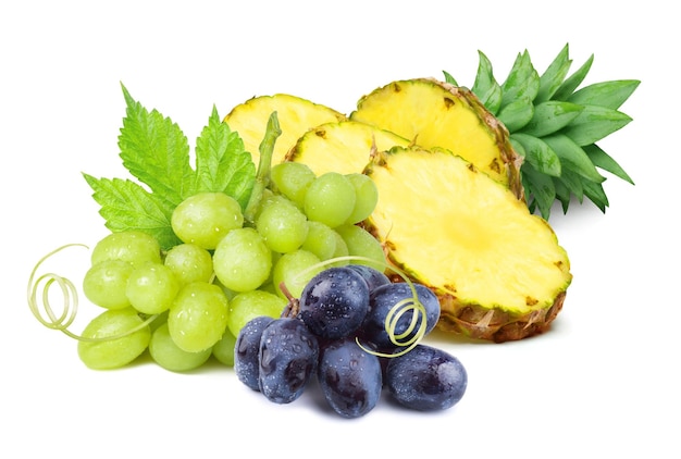 Fruit isolated. Ripe green blue grapes and pineapple.