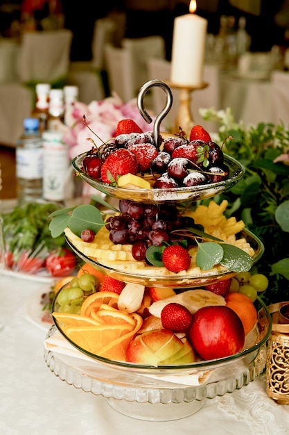 Fruit plate on the table of the newlyweds Wedding decoration