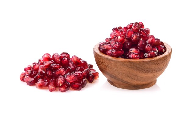 Fruit pomegranate in wood bowl  