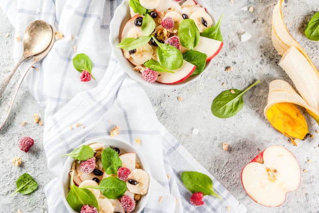 Fruit salad with spinach and granola