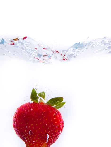 Fruits falling into the water