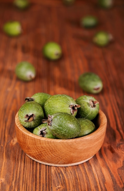 Fruits of feijoa in a wooden bowl on the table