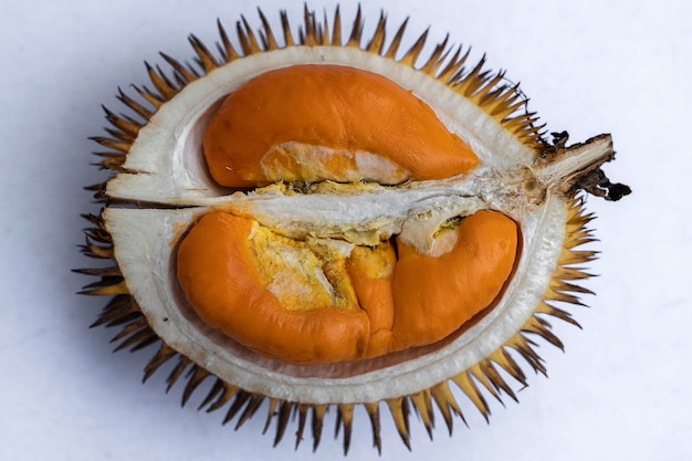 Fruits of Sabah Borneo called Durian Dalit and its flesh is in orange color The Durian Dalit for sell at the street market in Kota Kinabalu Malaysia close up