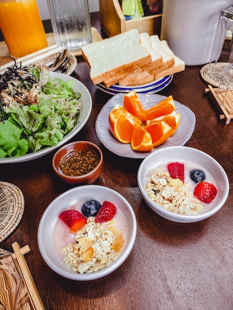 Fruits Salad and 2 yogurt for breakfast