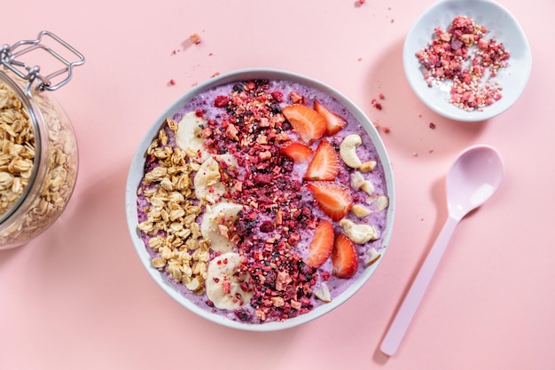 Fruity healthy muesli bowl on table