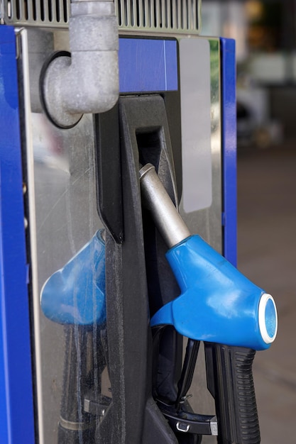 A fuel nozzle for filling a car with fuel at a petrol station