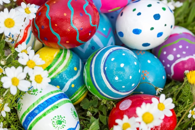 Full background of colorful, pastel, hand painted Easter eggs