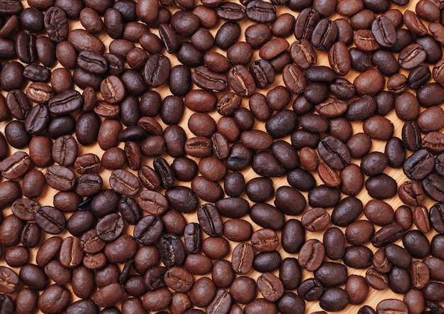 Full background of dark roasted coffee bean