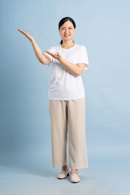 a full body photo of a middleaged woman