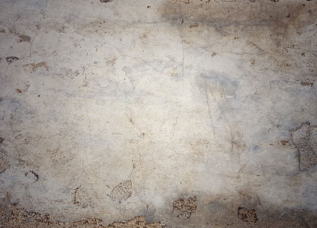 Photo full frame of cracked vintage retro concrete wall for material of background surface