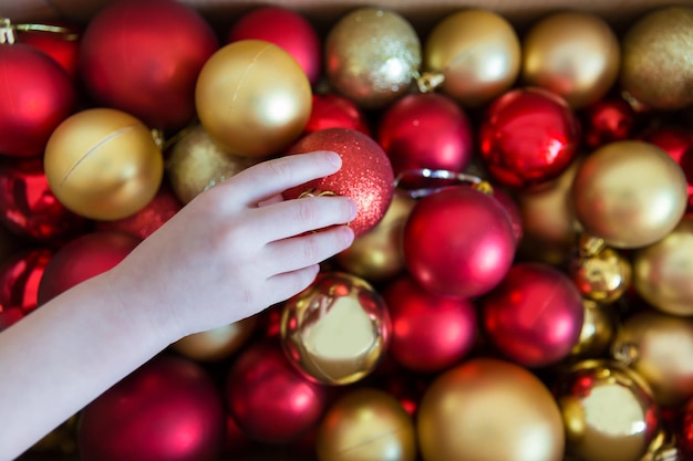 Full frame shot of Christmas ornaments red and gold Christmas tree decorations