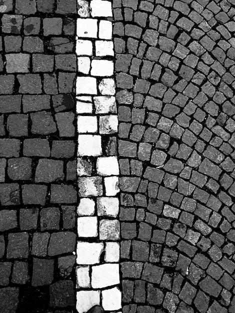 Photo full frame shot of cobbled footpath