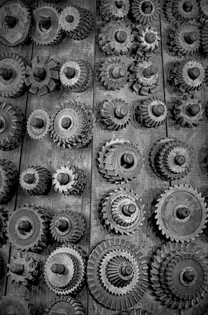 Full frame shot of metallic gears on table