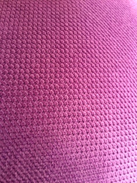 Full frame shot of pink woolen fabric