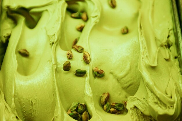 Photo full frame shot of pistachio on green ice cream