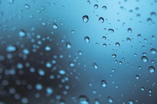 Photo full frame shot of raindrops on glass window