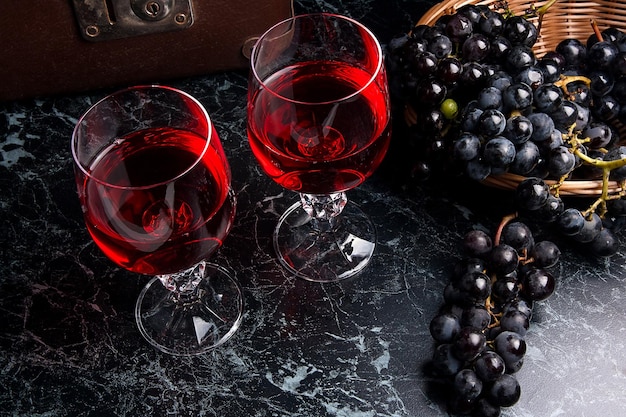 Full frame shot of red wine in glass on table