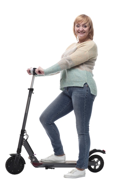 In full growth attractive casual woman with electric scooter